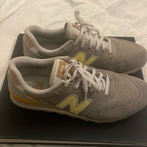 New Balance sneakers.